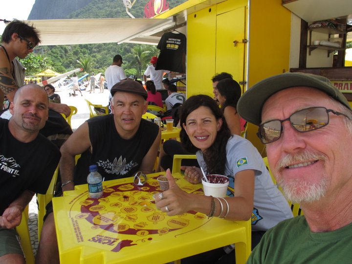  Gathering at a beach kiosk after paraglding 
